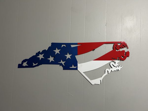 NC map outline with stars and stripes painted